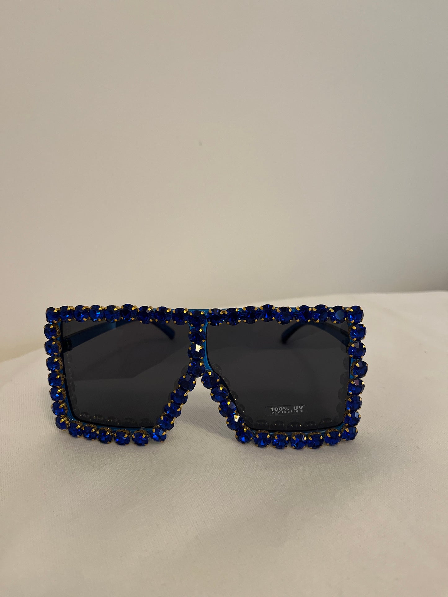 Large sunglasses with blue bling
