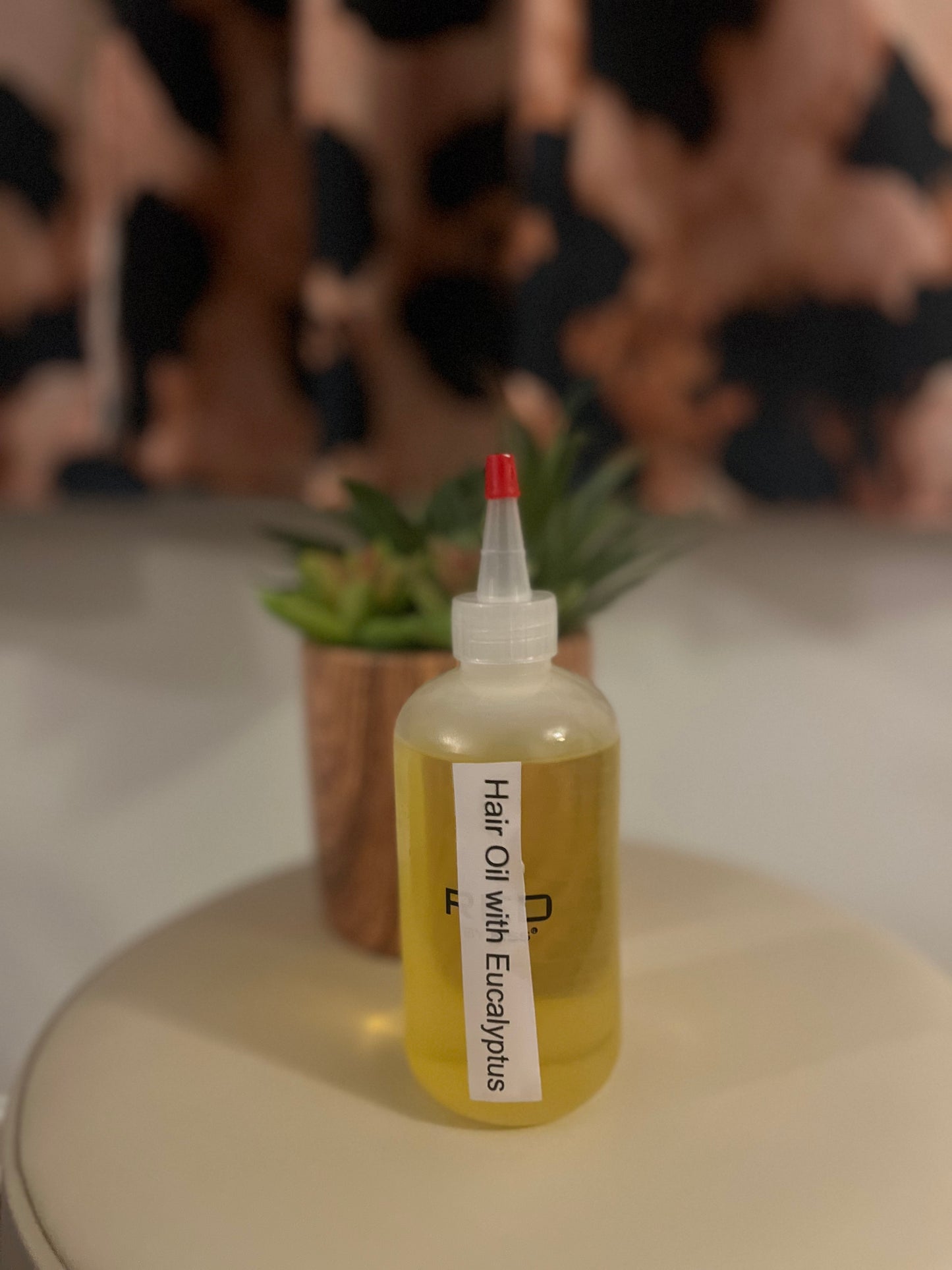 8 oz bottle hair oil w/ Eucalyptus