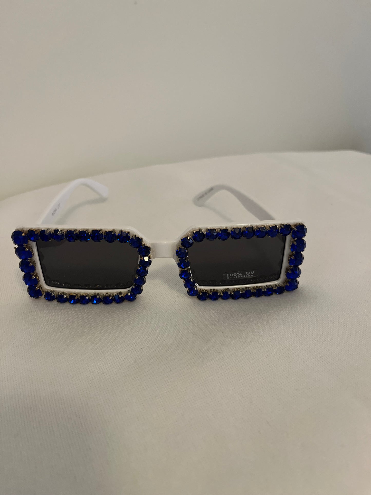 White frames with blue bling