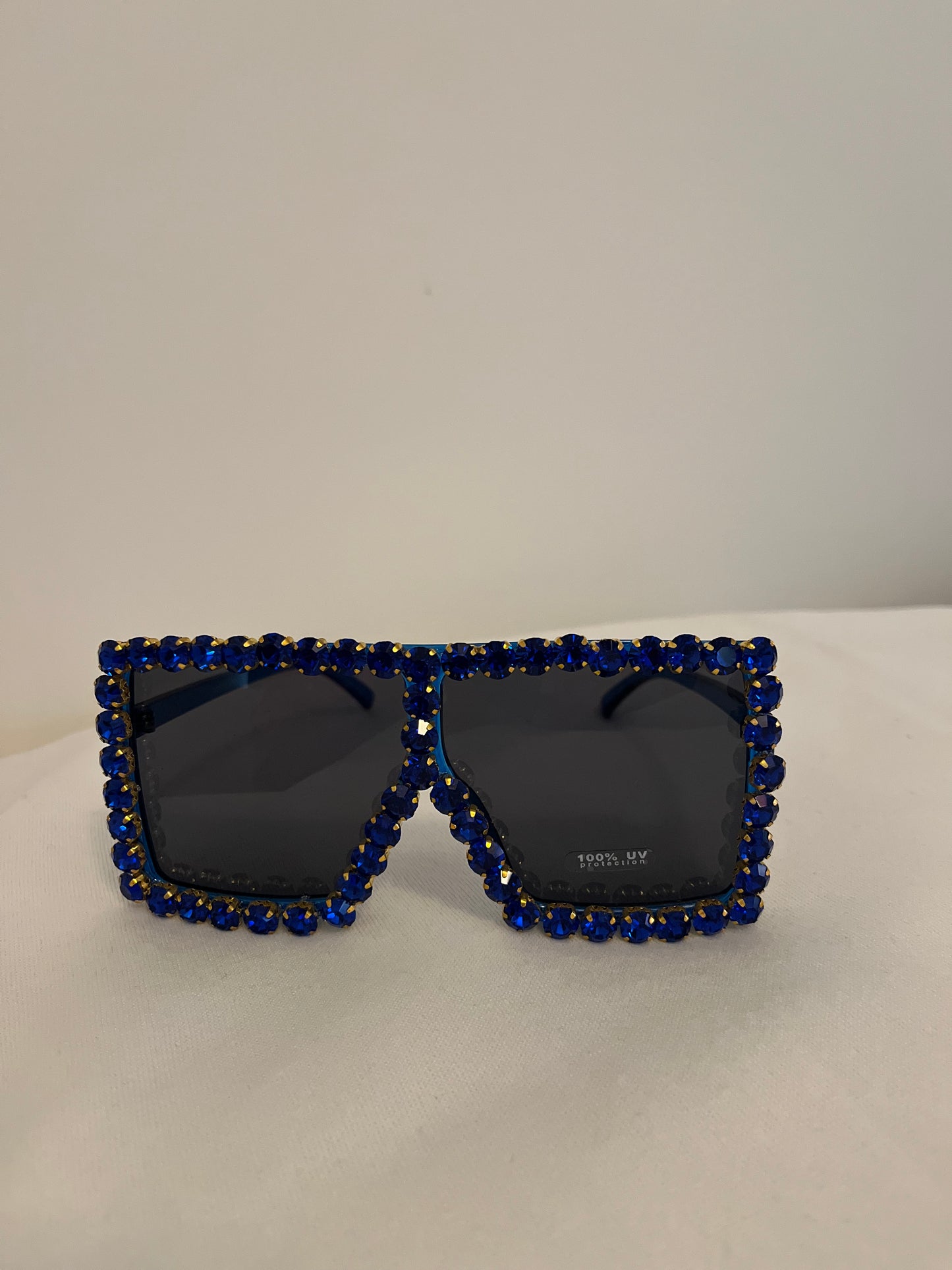 Large sunglasses with blue bling