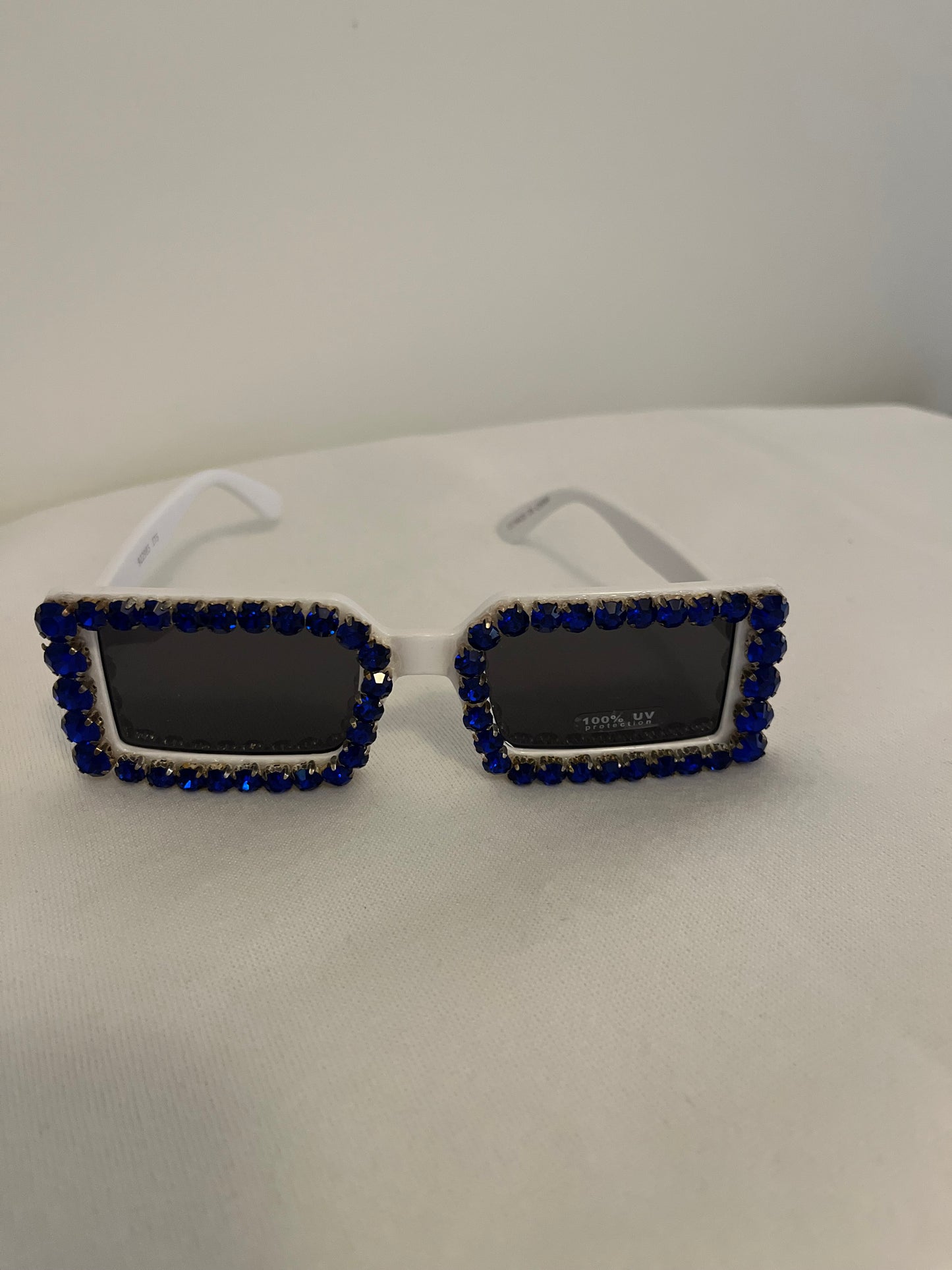 White frames with blue bling