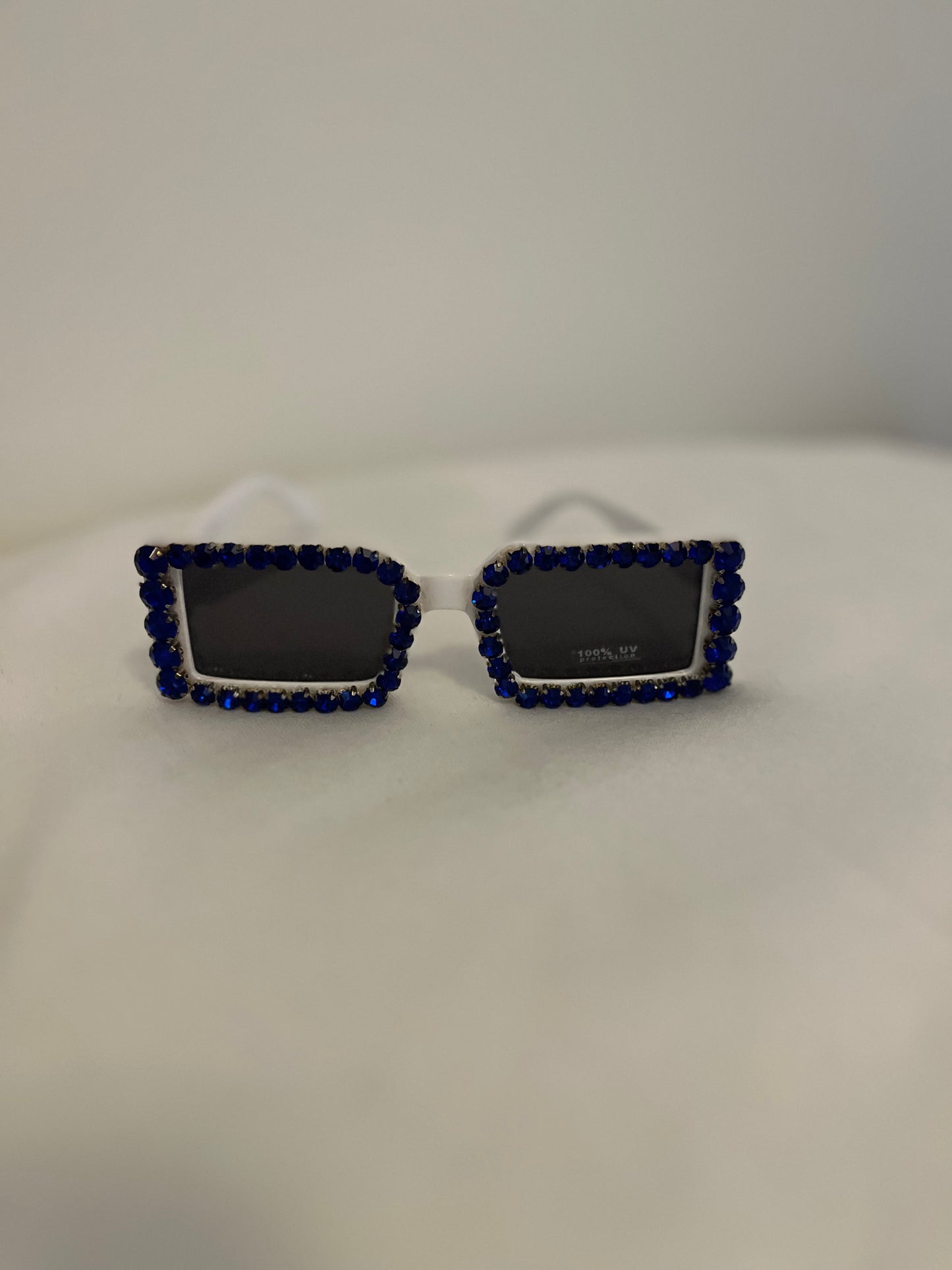 White frames with blue bling